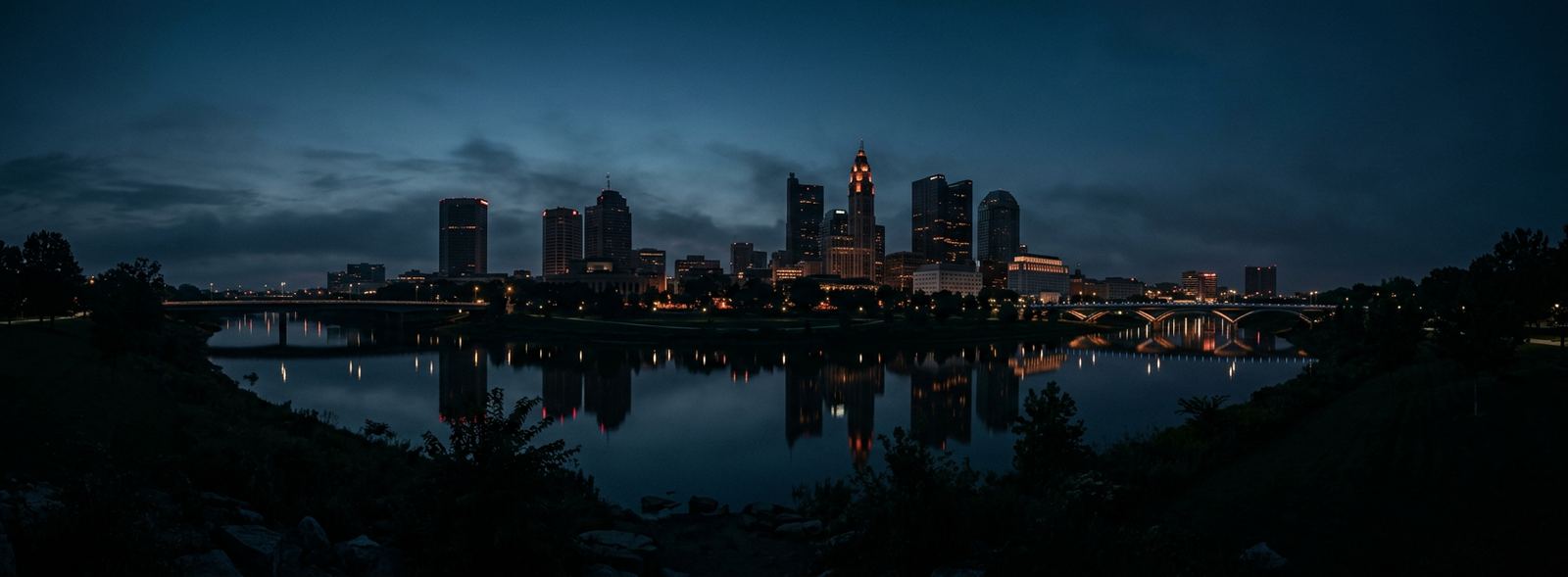 Aerial view of the Columbus, Ohio skyline at dusk, illustrating the metro area TactStack serves structural steel businesses in