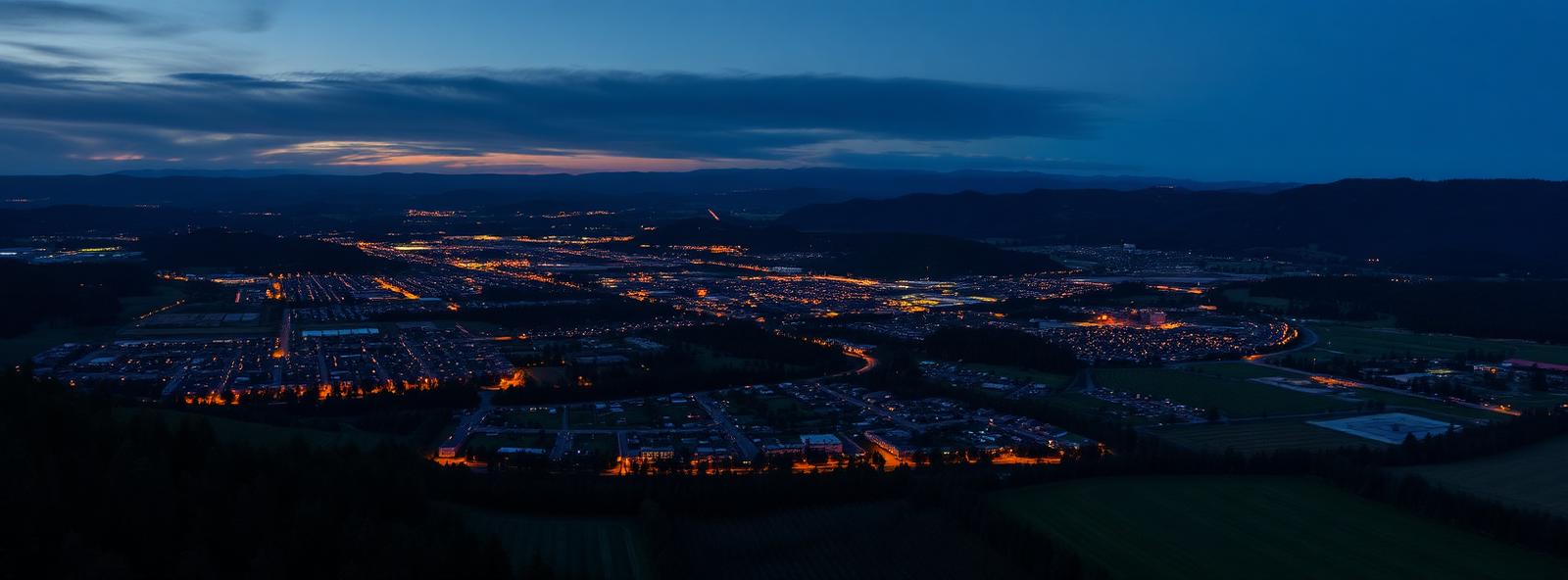 Aerial view of the Medford, Oregon skyline at dusk, illustrating the metro area TactStack serves structural steel businesses in