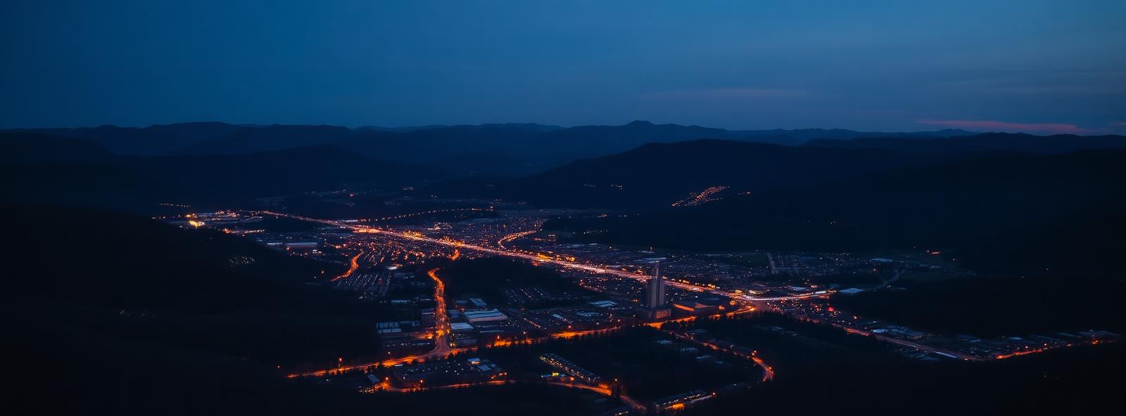 Aerial view of the Scranton, Pennsylvania skyline at dusk, illustrating the metro area TactStack serves structural steel businesses in