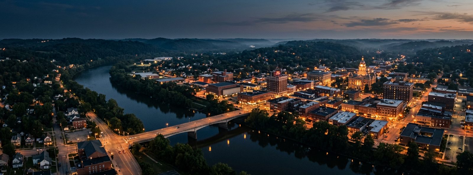 Aerial view of the Zanesville, Ohio skyline at dusk, illustrating the metro area TactStack serves 3d printing businesses in